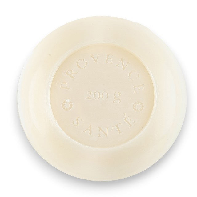 A blue octagonal box of BAUDELAIRE - JASMINE 7OZ BOXED BATH BAR displays a bold white floral design and text highlighting its jasmine scent and French origin.