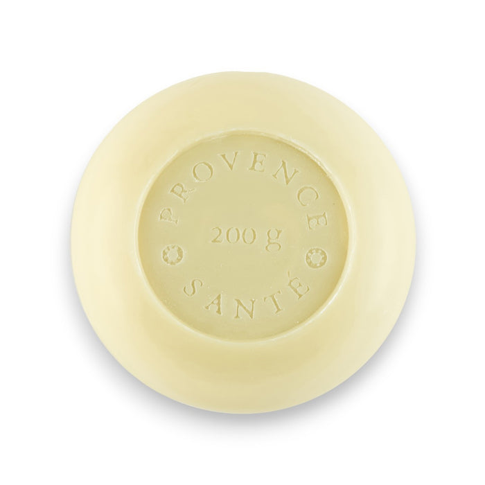 An orange, octagonal box labeled "BAUDELAIRE - SWEET ALMOND 7OZ BOXED BATH BAR" with a large yellow flower illustration. This French-milled soap is 7oz, made in France, and features English and French text.