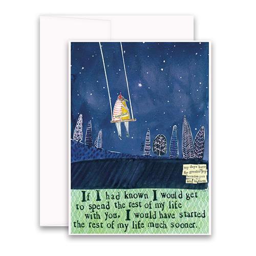 The CURLY GIRL DESIGNS - STARTED MUCH SOONER GREETING CARD by CURLY GIRL DESIGN, INC features a person on a swing under starry skies with whimsical trees and colorful collage art. Blank inside for your message.