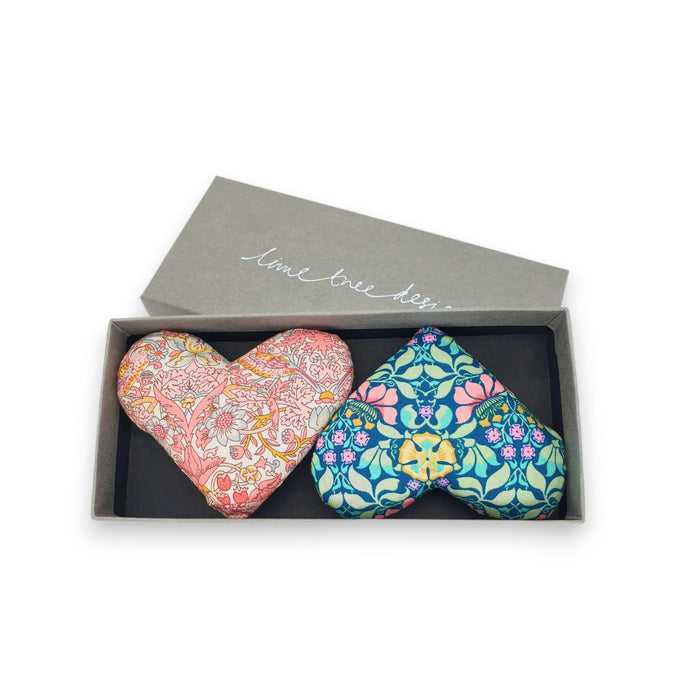 A gray box labeled "LIME TREE COLLECTION LTD" holds two Liberty Tana Lawn floral HEARTS AND MOTHERS PRIDE SACHETs—one pink, one blue—making a charming handmade gift, shown on a white background.