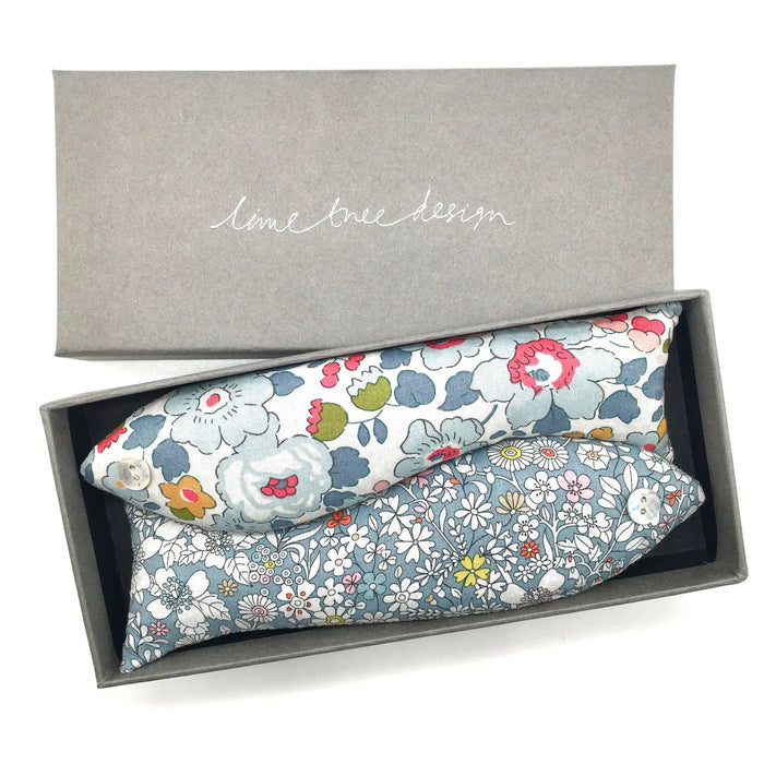 A grey gift box from LIME TREE COLLECTION LTD holds two LAVENDER FISH - LADY JANE GRAY SACHETs made from Liberty Tana Lawn fabric—ideal as handmade lavender drawer scenters or calming sachets.