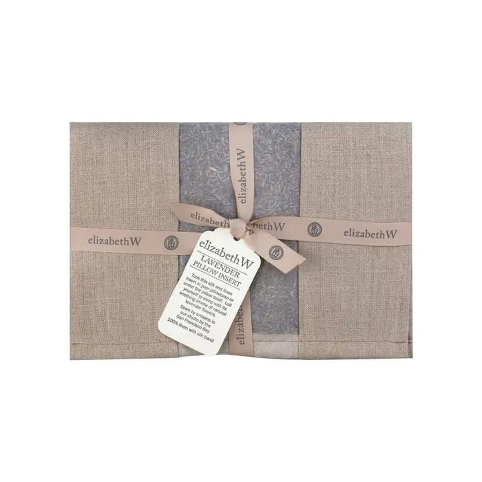The LAVENDER PILLOW INSERT IN NATURAL LINEN by E WIGHTMAN & CO features a beige linen sachet filled with lavender, tied with a matching ribbon and product tag—a perfect aromatherapeutic sleep aid displayed on a white background.