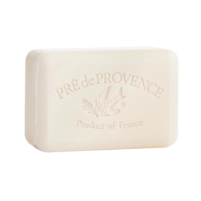 A rectangular, cream-colored MILK BAR SOAP 150G by EUROPEAN SOAPS, LLC, quad-milled and embossed with "PRÉ de PROVENCE," a bird with an olive branch, and "Product of France" below.