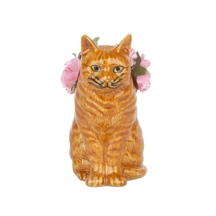 The QUAIL CERAMICS - VINCENT CAT BUD VASE by QUAIL DESIGNS is a hand-painted ceramic vase shaped like an orange tabby cat, featuring pink artificial roses arranged on its back.