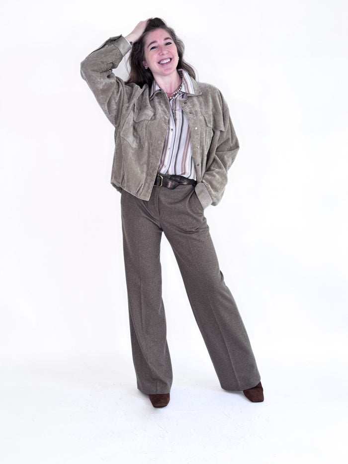 The SEVENTY VENEZIA Stripe Blouse by SEVENTY is an Italian-made viscose shirt with long sleeves, a classic collar, and vertical stripes in white, beige, brown, and gray. Its slightly loose fit provides effortless style.
