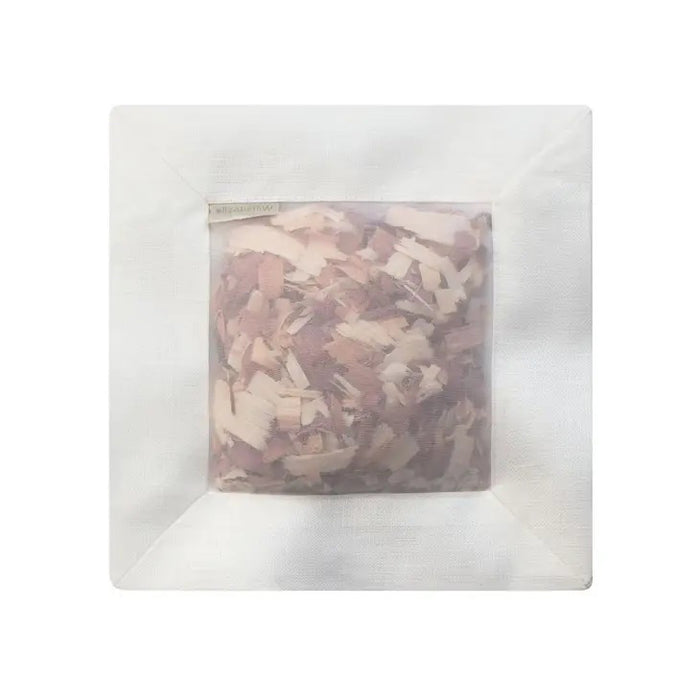 An ivory linen SQUARE CEDAR SACHET by E WIGHTMAN & CO, featuring a square shape and photographed on a plain white background.