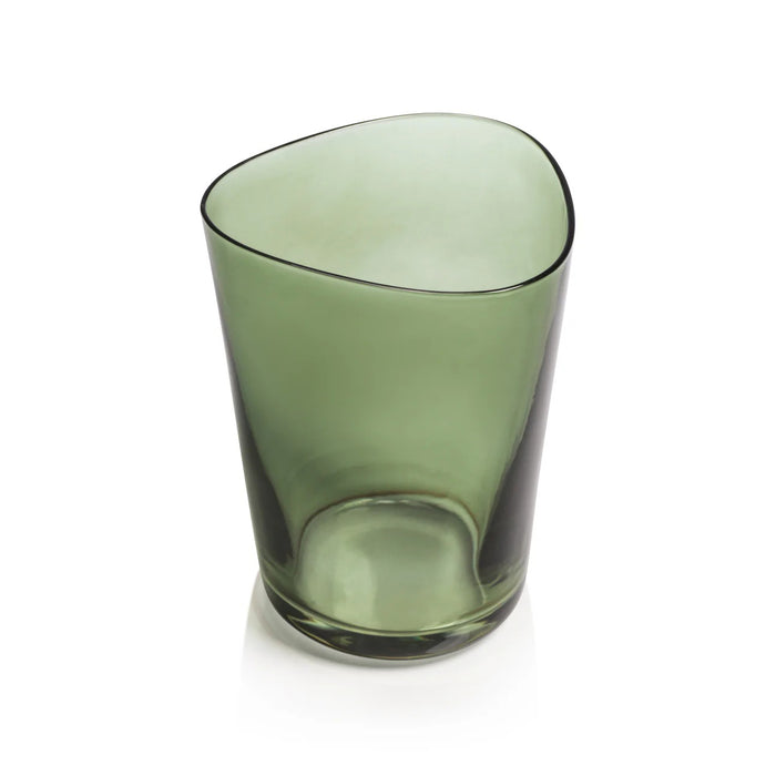 The APERITIVO TUMBLER IN GREEN by ZODAX is a 400 ml soda-lime glass cup with an irregular, organic-shaped rim and a smooth translucent green finish, displayed on a white background.