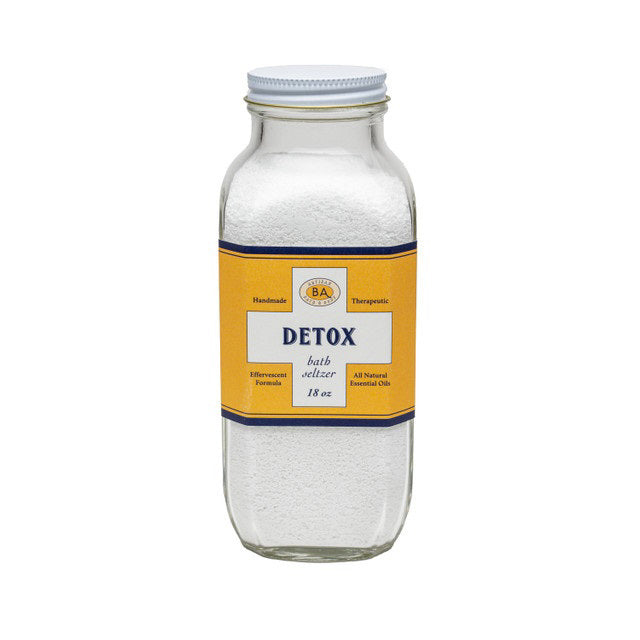 A clear glass jar of BAUDELAIRE DETOX BATH SELTZER 18oz features a yellow and blue label with "Handmade," "Therapeutic," and essential oils. Perfect for relaxing, effervescent soaks. Brand: BAUDELAIRE.