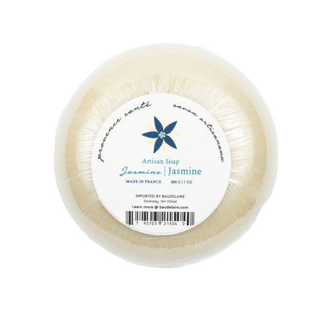 A blue octagonal box of BAUDELAIRE - JASMINE 7OZ BOXED BATH BAR displays a bold white floral design and text highlighting its jasmine scent and French origin.