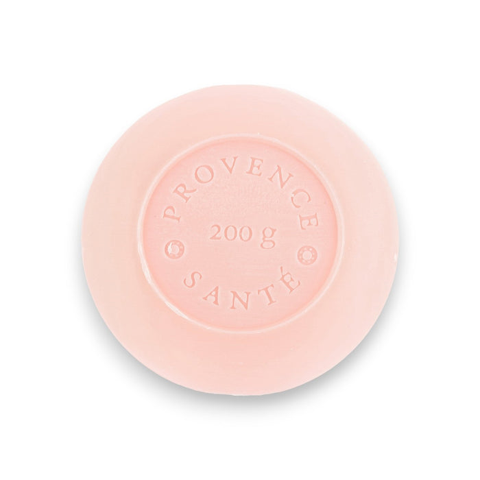 A hexagonal box of BAUDELAIRE Wild Rose 7oz Bath Bar, featuring a pink rose design and white text. This French-milled soap is enriched with shea butter, weighs 200g (7oz), and is marked “Made in France.”.