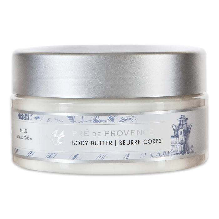 A 6.7 oz (200 ml) jar of EUROPEAN SOAPS, LLC BODY BUTTER - MILK features a silver lid and building sketch packaging. Enriched with Shea Butter for deep moisture.