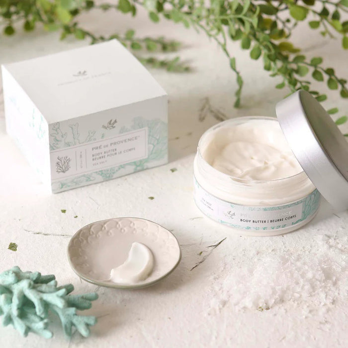 A 200 ml jar of EUROPEAN SOAPS, LLC BODY BUTTER - SEA SALT with a silver lid and a light green and white sea-inspired label; this French artisan moisturizer features a fresh sea salt scent.