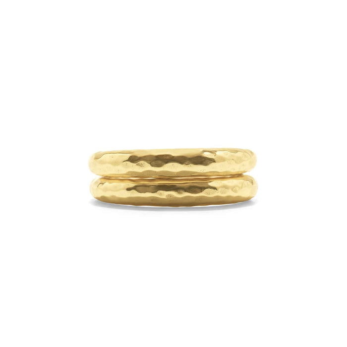 The CAPUCINE DE WULF - CLEOPATRA SLICE STACKING RINGS, featuring a textured hammered finish of 18K Gold over Brass, are displayed on a white background. Their shiny surface subtly reflects light.