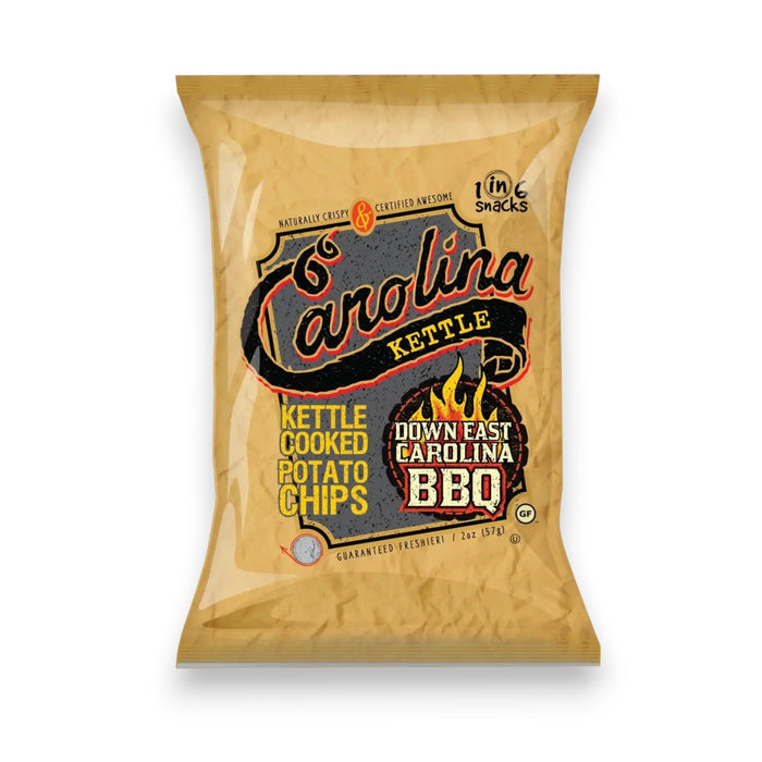 A bag of CAROLINA KETTLE - DOWN EAST BBQ CHIPS from 1 IN 6 SNACKS, featuring a brown and orange design with BBQ flames and bold text, delivers the authentic taste of Eastern North Carolina BBQ sauce accented by a hint of smoky charcoal flavor—making it a true standout among snack foods.
