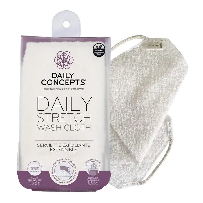 The DAILY CONCEPTS DAILY STRETCH WASH CLOTH is pictured next to its unfolded, textured white cloth with handles. The packaging notes it’s organic, vegan, biodegradable, reusable, and perfect for daily exfoliation.
