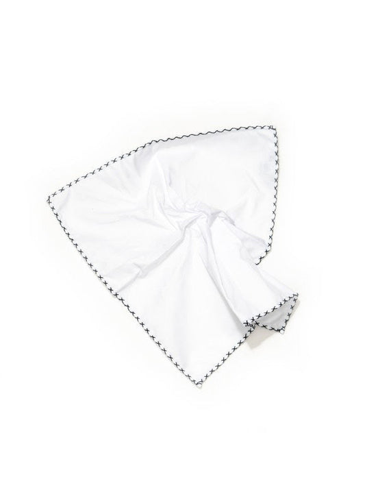 The EDWARD ARMAH Hem Stitched Pocket Square features a white cotton design with scalloped edges and black stitched X patterns, displayed against a crisp white background.