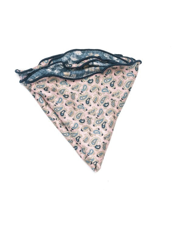 The EDWARD ARMAH Reversible Silk Pocket Circle in Pink Denim Leaf features blue and beige floral patterns on one side and a contrasting pink and green paisley print on the reverse.