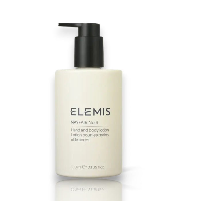 A 300 ml (10.1 US fl. oz.) bottle of ELEMIS - STEINER MAYFAIR NO. 9 HAND & BODY LOTION, cream-colored with a black pump and label, enriched with Shea Butter to moisturize skin.