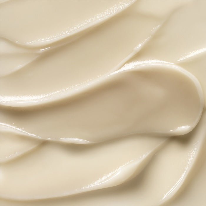 A light blue jar of ELEMIS - PRO-COLLAGEN VITALITY EYE CREAM by ELEMIS - STEINER, filled with creamy off-white product. The label says "Replenishing eye cream" and the jar sits on a white background with a visible reflection beneath it.