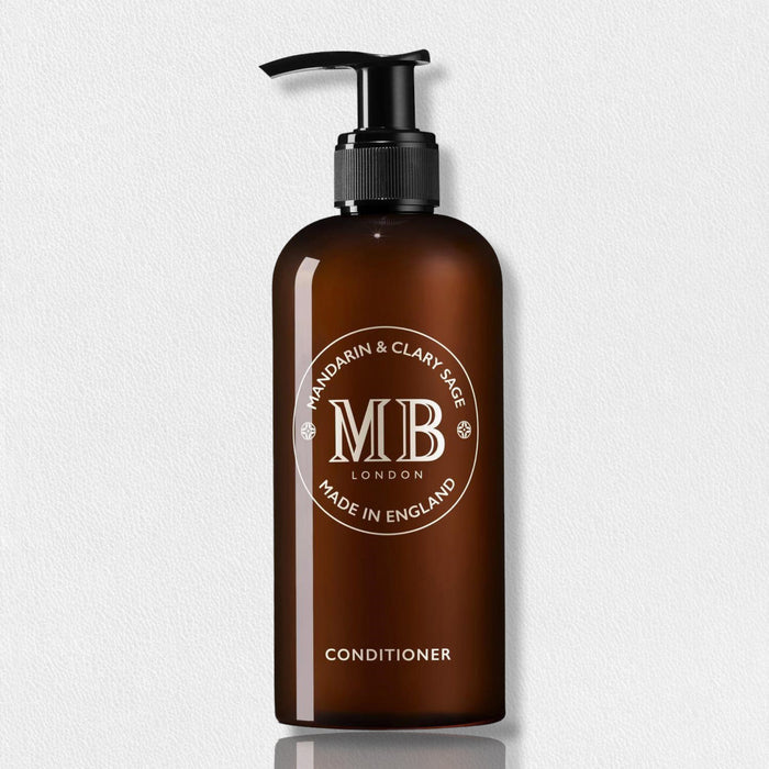 A brown pump bottle of MOLTON BROWN 1971 COLLECTION Mandarin Clary Sage Conditioner is shown on a white background, featuring a circular "Mandarin & Clary Sage, Made in England" logo and botanical extracts.