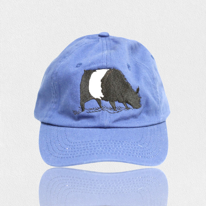 The VALUCAP THREDS FEARRINGTON LIFESTYLE COLLECTION - YOUTH BELTIE TWILL HAT is a blue cotton cap with an embroidered black and white badger on the front, displayed on a plain white background.
