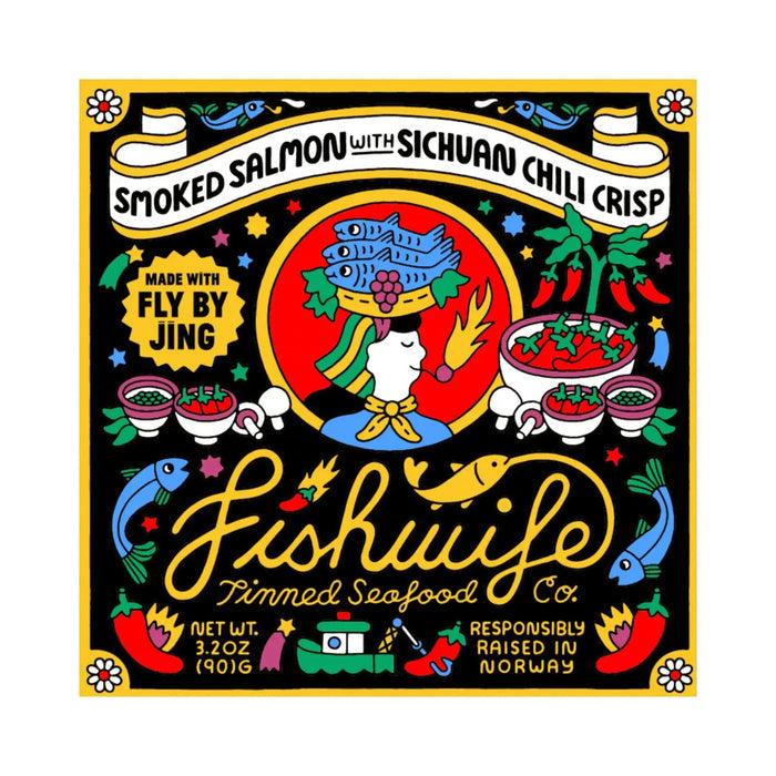A can of FISHWIFE's SMOKED SALMON WITH FLY BY JING SICHUAN CHILI CRISP is open, its contents arranged neatly inside. The visible salmon and hint of chili crisp offer a zesty flavor boost against a plain white background for an appetizing display.