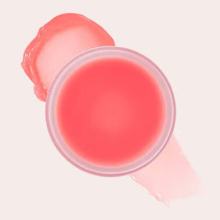 A round beige container labeled "JASON WU - GOODNIGHT MR WU LIP MASK" by JASON WU BEAUTY sits open on a pink surface, suggesting its shea butter-rich overnight formula. A red "Allure Best of Beauty Award Winner 2022" badge appears in the upper right.
