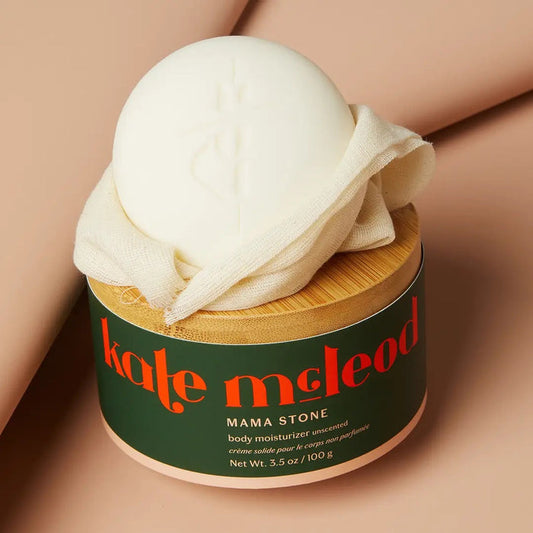 The KATE MCLEOD Mama Stone Deep Moisturizing Lotion Bar 3.5oz is rich in fatty acids, soothes dry skin, nourishes your skin barrier, and is ideal for prenatal skincare and stretch mark prevention.