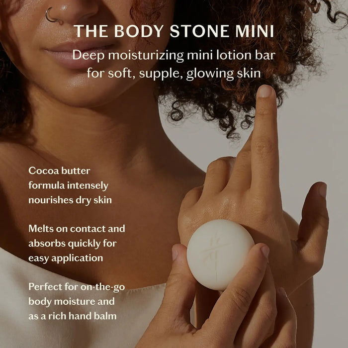 The KATE MCLEOD SCENT DISCOVERY SET features three mini, round white lotion bars with a plant-based formula. The bars come in green and orange branded packaging, stacked beside a larger box on a light green background.