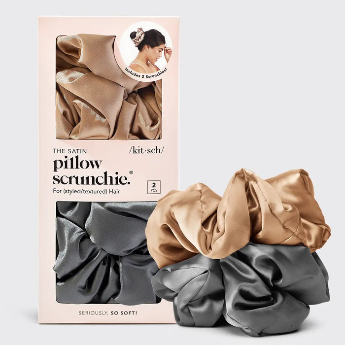 A KITSCH - SATIN SLEEP PILLOW SCRUNCHIES box includes two large satin scrunchies—one gold, one gray—shown outside the box to showcase their soft, frizz-reducing texture.