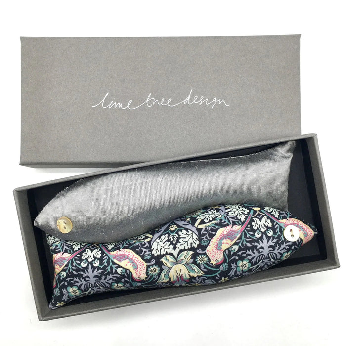 A lavender gift box from LIME TREE COLLECTION LTD contains two handmade fish-shaped sachets—one gray, one with a "Strawberry Thief" floral print. Both LAVENDER FISH SACHETS feature charming button eyes.