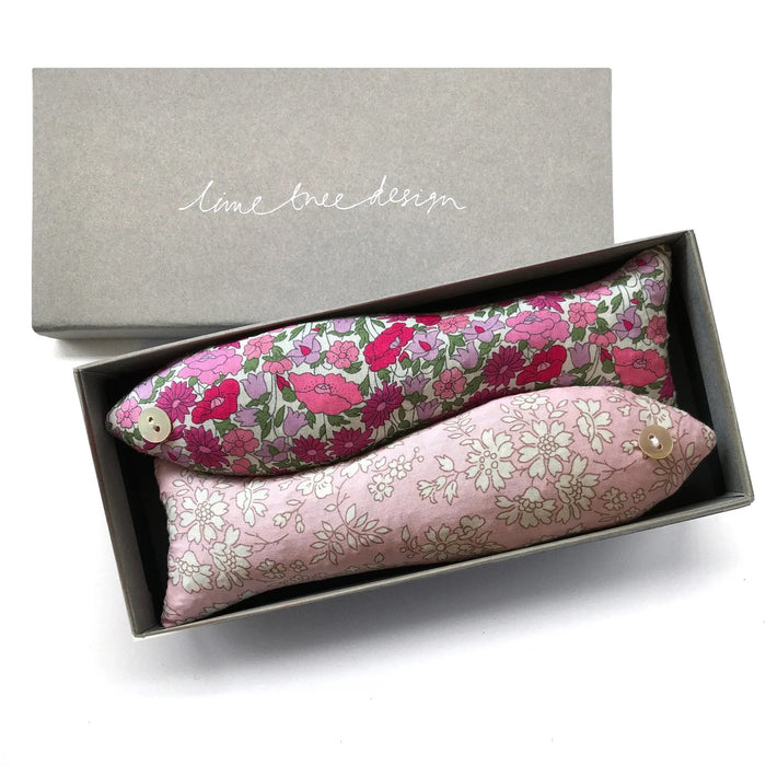 The LAVENDER FISH AND LITTLE PRINCESS SACHET by LIME TREE COLLECTION LTD features two Liberty Tana Lawn fabric fish in floral prints, nestled in a grey “lime tree design” box—ideal handmade lavender gifts or delightful drawer scenters.