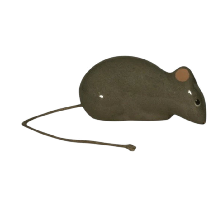 The LES CERAMIQUES DE LUSSAN - GREY LYING DOWN MOUSE by LES CERAMIQUES DE LUSSAN is a handmade ceramic figurine featuring a glossy gray body, a pink ear, a black eye, and a thin, straight tail, displayed on a white background.