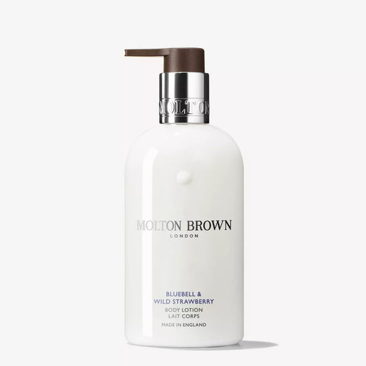 A white pump bottle of MOLTON BROWN Bluebell & Wild Strawberry Body Lotion with silver details, displayed on a plain white background—ideal for fans of floral and fruity scents.