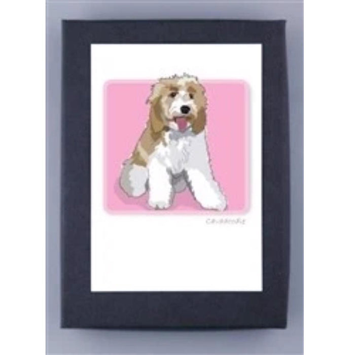 PAPER RUSSELLS - CAVADODDLE NOTE CARDS feature a fluffy, light brown and white dog with an open mouth and visible tongue, sitting on a pink background. Made in the USA on FSC certified recycled paper; cards come in a white mat with dark frame.
