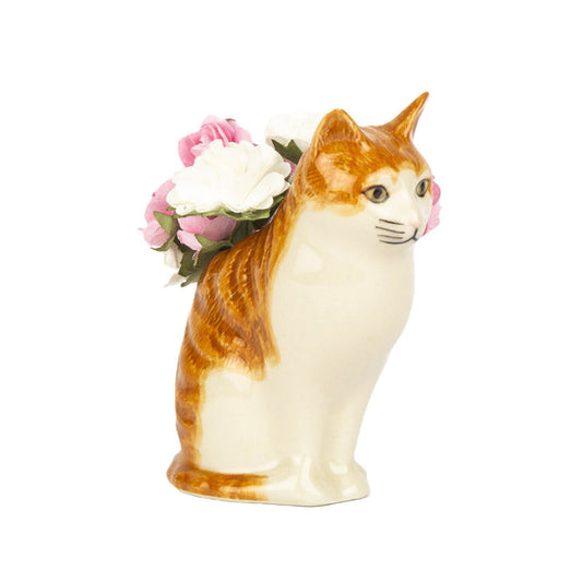The QUAIL CERAMICS - SQUASH CAT BUD VASE by QUAIL DESIGNS is a handpainted orange and white ceramic cat figurine, decorated with artificial pink and white flowers on its back.