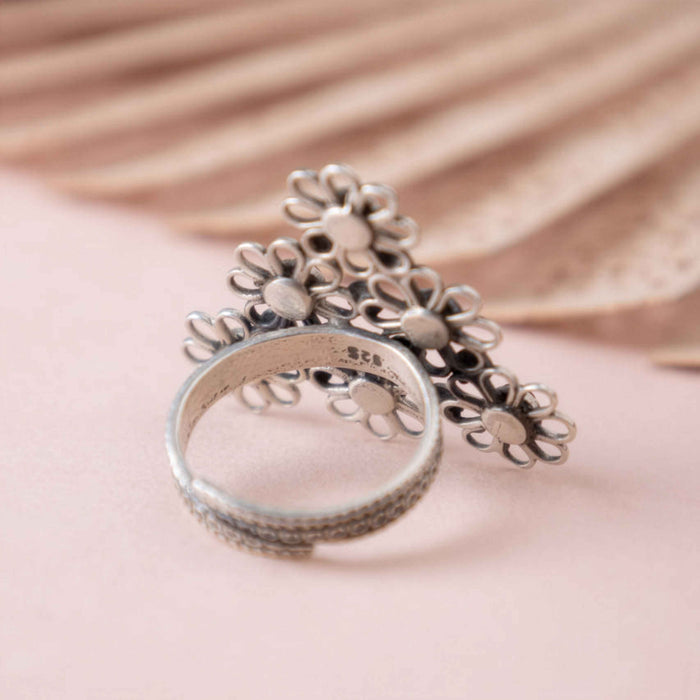 Tattva Carved flower statement green ring